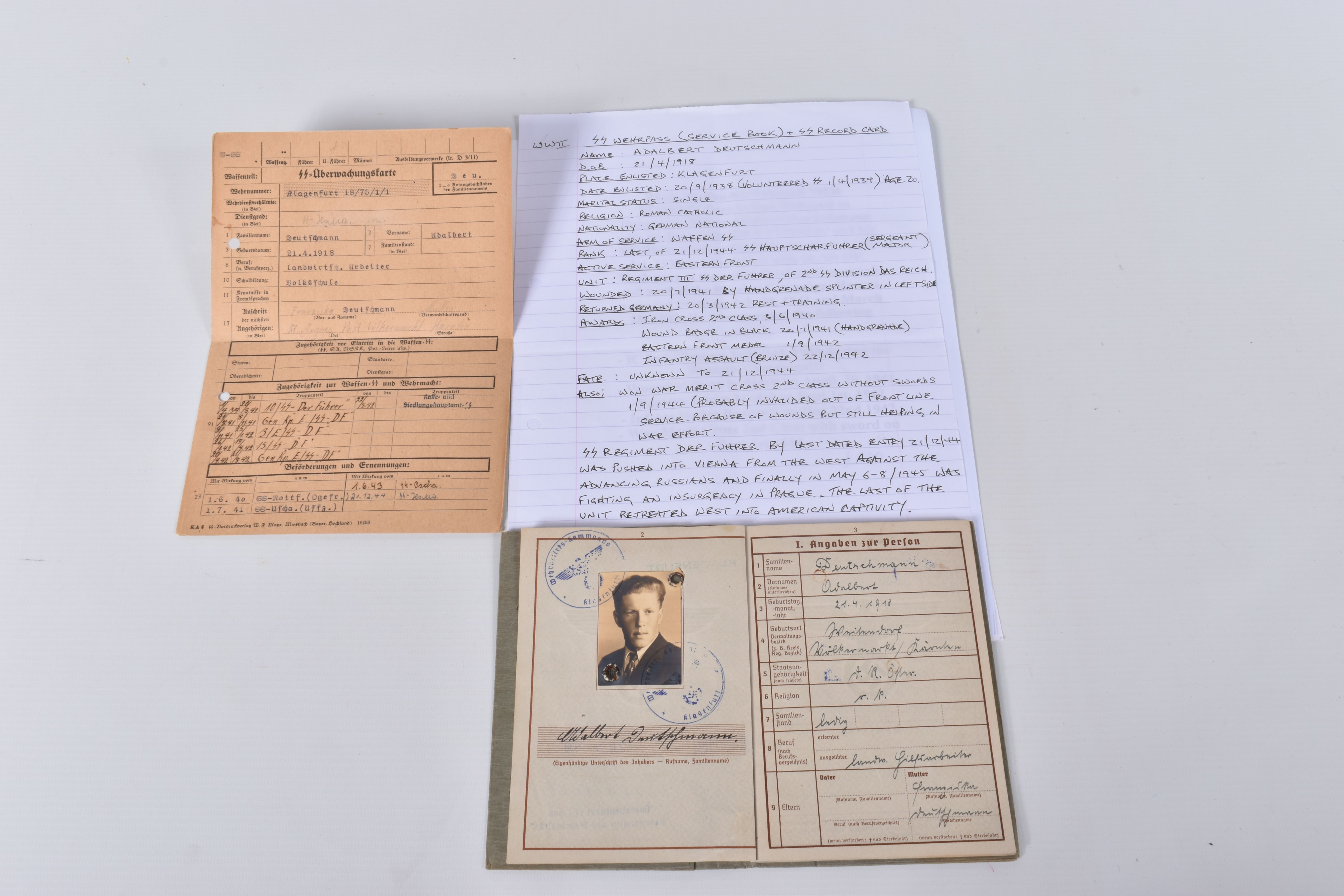 SS WEHRPASS (SERVICE) BOOK AND SS RECORD CARD for Adalbert Deutschmann, DOB 21/04/1918. place