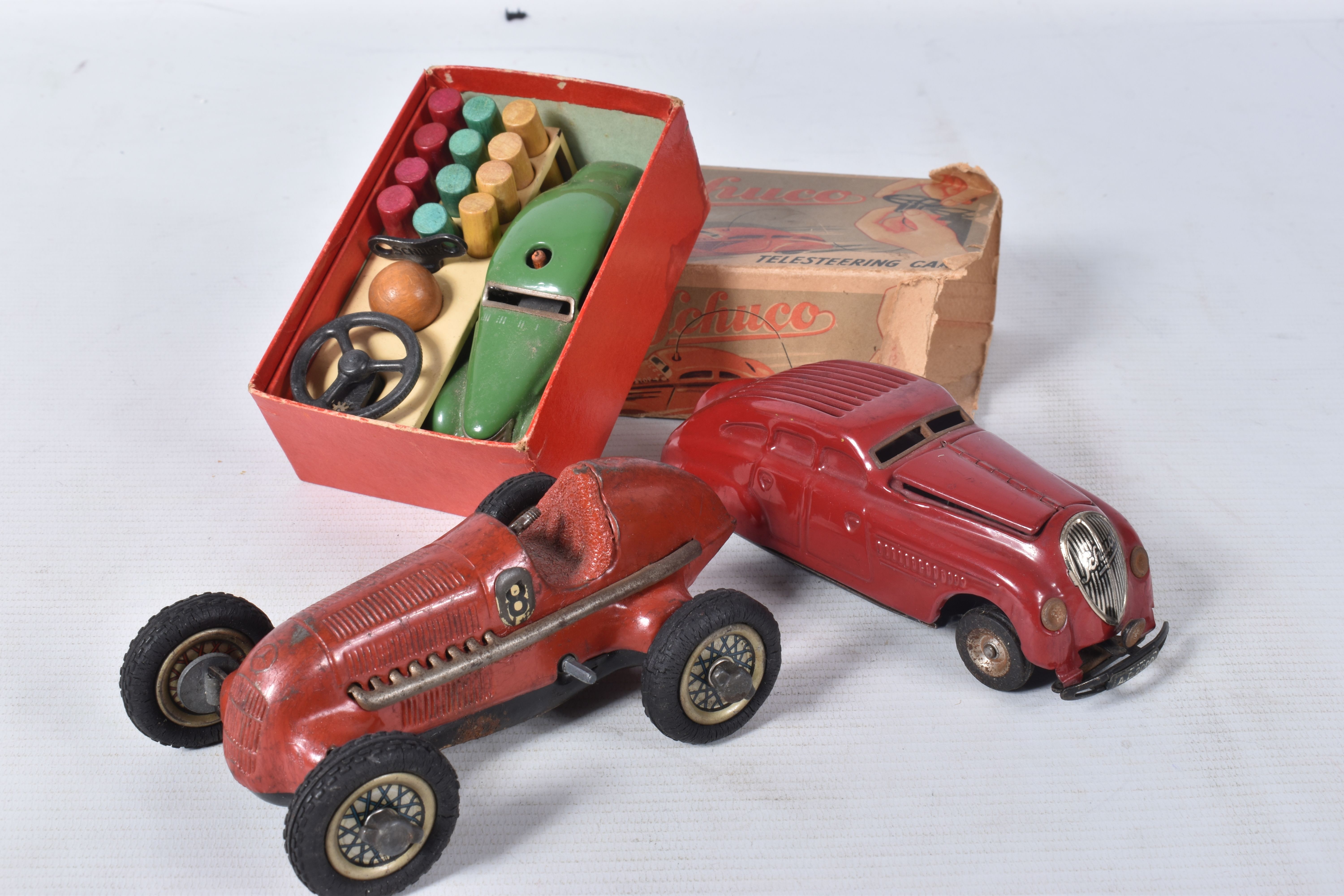 A BOXED SCHUCO 3000 TELESTEERING CAR, version with green car which appears complete and in good