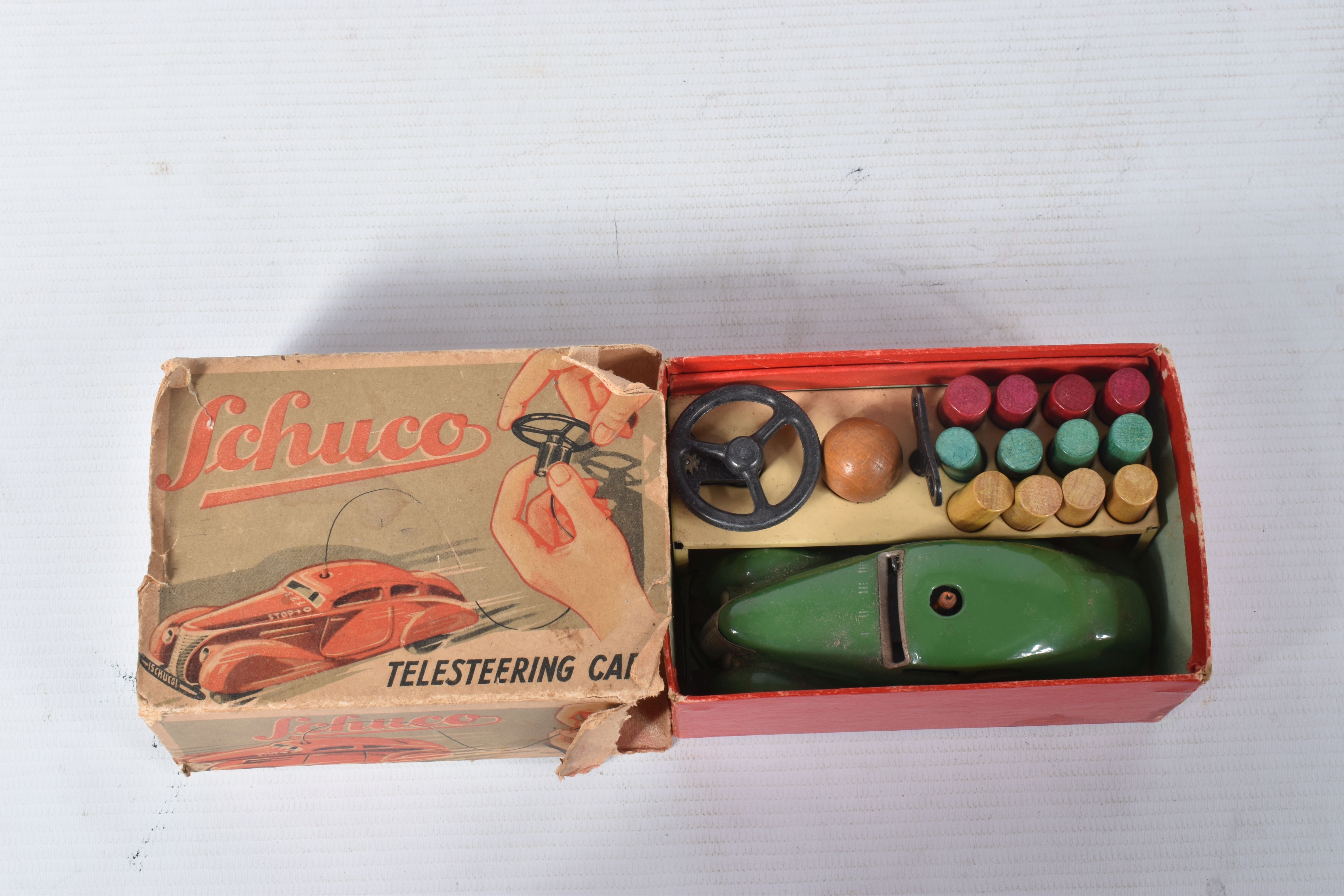 A BOXED SCHUCO 3000 TELESTEERING CAR, version with green car which appears complete and in good - Image 7 of 7