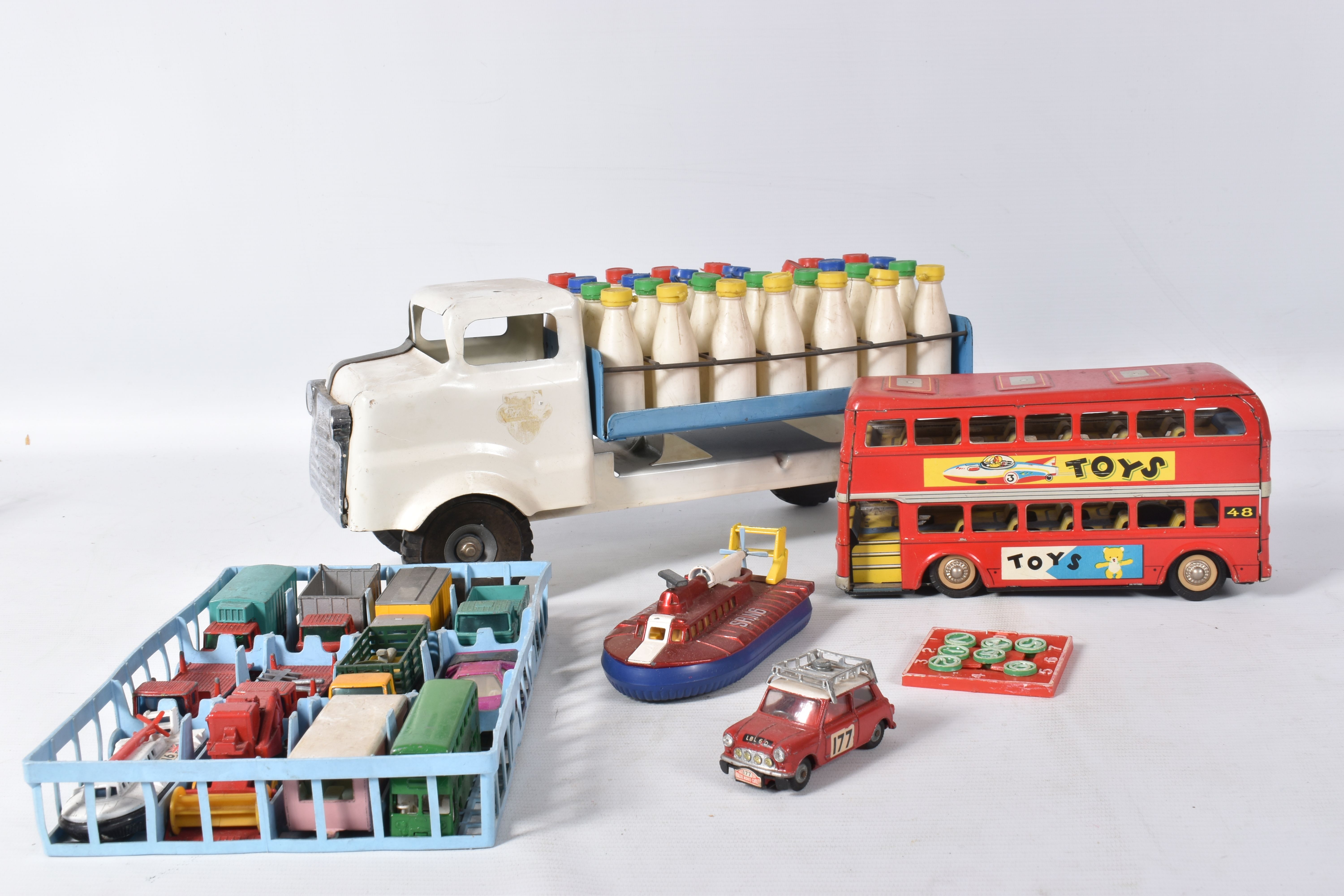 A QUANTITY OF UNBOXED AND ASSORTED PLAYWORN DIECAST VEHICLES, to include Corgi Toys Mini Cooper S