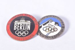 TWO 1936 BERLIN OLYMPIC BADGES, these are from both summer and winter games, the first is red and
