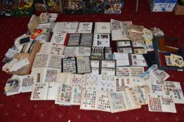 VERY LARGE ACCUMULATION OF STAMPS IN NUMEROUS ALBUMS AND LOOSE, we note worldwide collections, GB