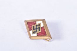 A GERMAN GOLD HITLER YOUTH MEMBERS HONOR BADGE, this badge is die struck alloy with a gold wash