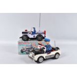 A BOXED NOMURA TN TOYS BATTERY OPERATED TINPLATE STICK SHIFT POLICE JEEP, No.7507, not tested,