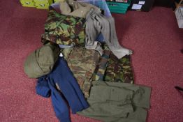 A BOX OF MIXED ARMY CLOTHING, to include, trousers, shirts, jumper etc, the majority are olive green