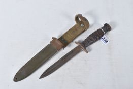 A US ARMY FIGHTING KNIFE, the blade is clearly marked 'U.S.M3 PAL' but has no date, the scabbard and