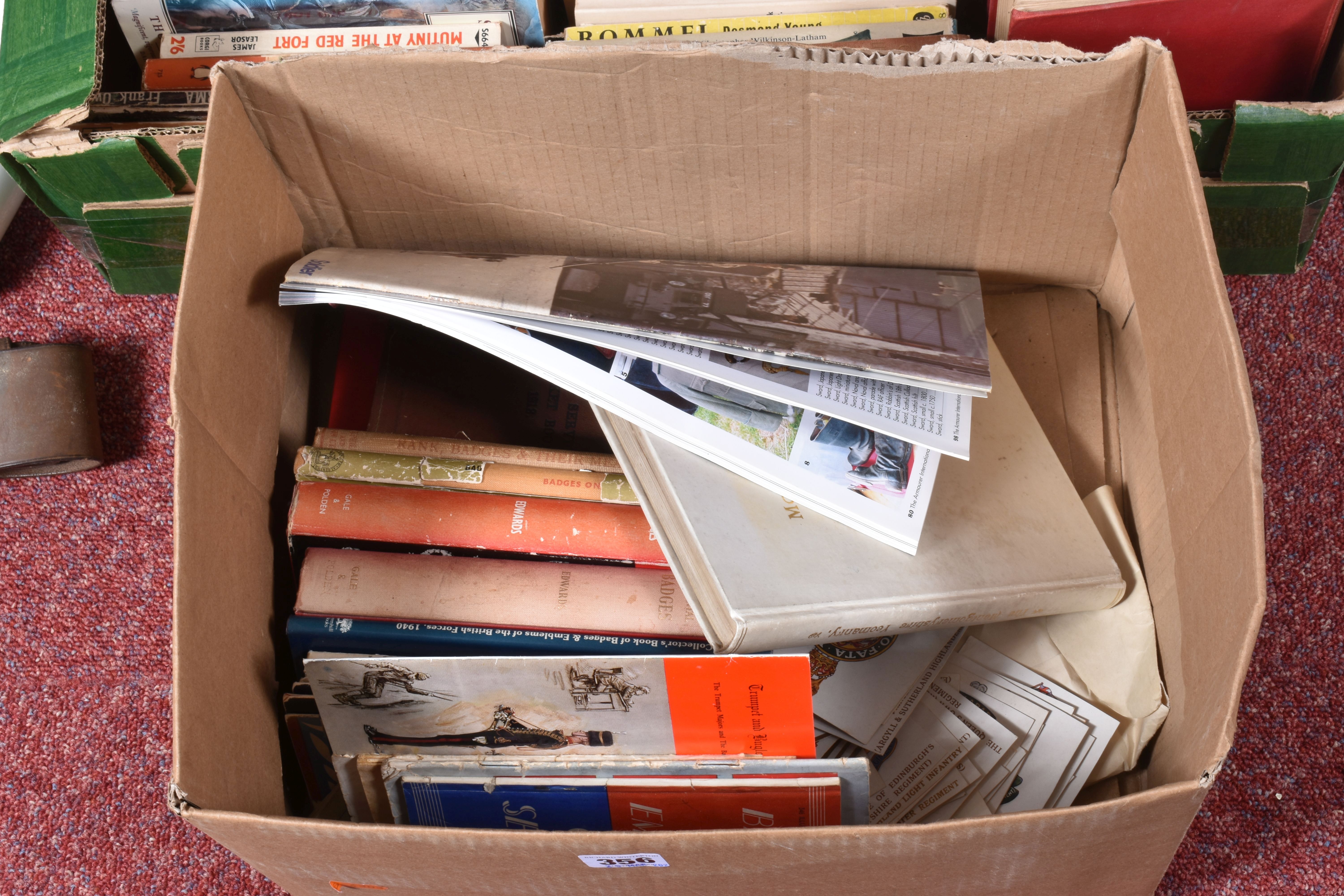 TWO BOXES OF BOOKS AND OTHER MILITARY RELATED ITEMS, to include a border regiment mug, a butter or - Image 3 of 9