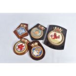 FIVE ROYAL NAVAL PERIOD SHIPS CRESTS ALL MOUNTED ON WOODEN HANGING PLINTHS, wood and plaster