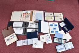 COLLECTION OF STAMPS AND FIRST DAY COVERS, main value in eight silver medallic covers/sets