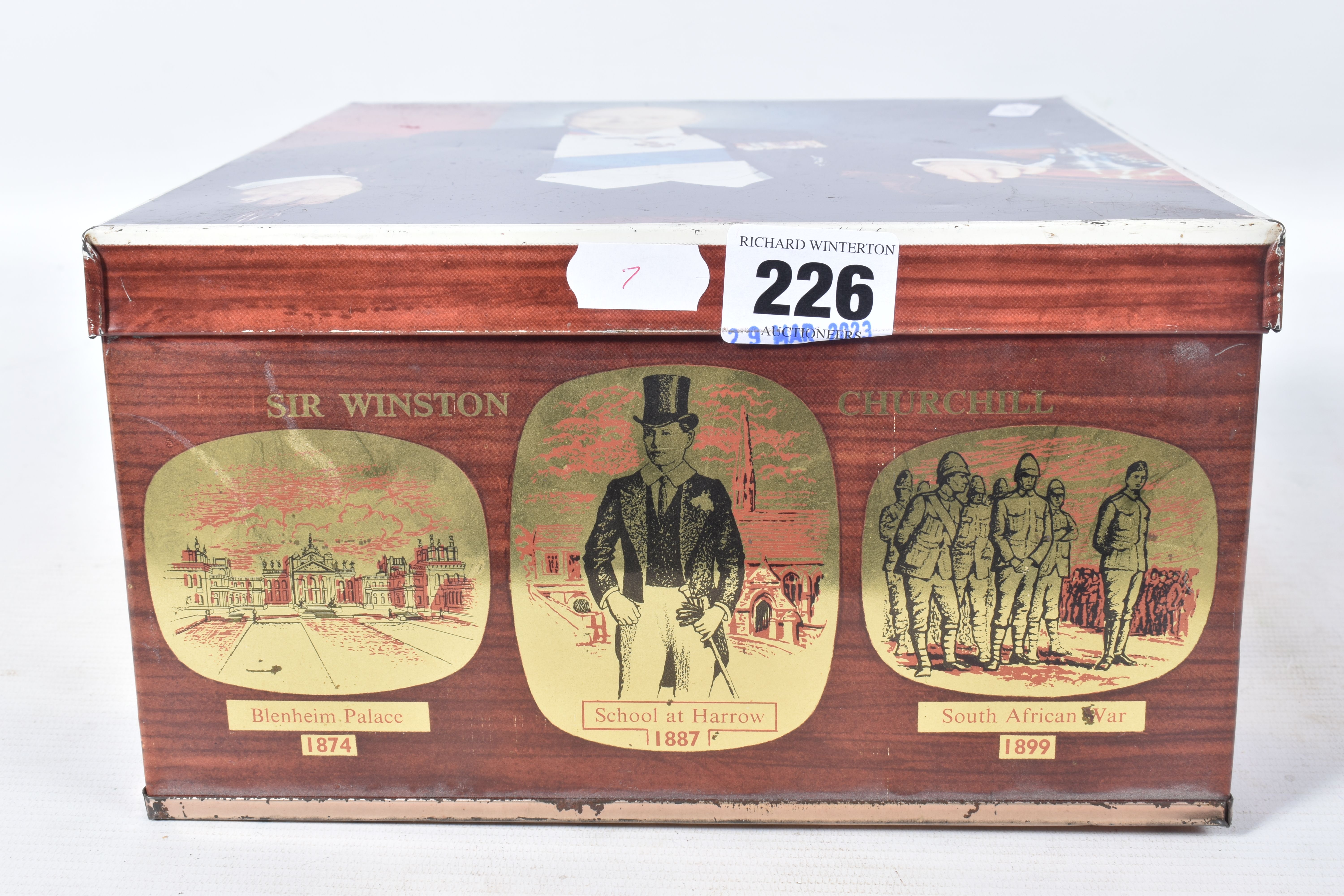 A WINSTON CHURCHILL BISCUIT TIN, containing a hallmarked silver cigarette holder, a cased set of - Image 6 of 17