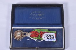 A THAILAND ORDER OF THE WHITE ELEPHANT MEDAL, with ribbon rosette, this award is 5th class and comes