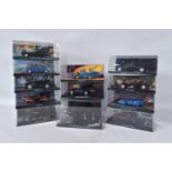 TWELVE EAGLEMOSS DC VEHICLES IN ACRYLIC CASES, to include a Dark Knight Rises the Bat, various other