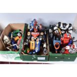 A QUANTITY OF UNBOXED AND ASSORTED ACTION FIGURES AND ROBOTS ETC., to include Tiger Electronics