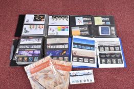THREE ALBUMS WITH PRESENTATION PACKS FROM 1970S TO 1990S, approximately two hundred packs