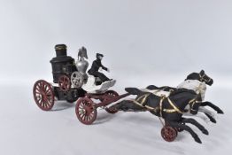 A CAST IRON HORSE DRAWN FIRE ENGINE, not marked but in the style of Hubley, has been repainted/