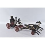 A CAST IRON HORSE DRAWN FIRE ENGINE, not marked but in the style of Hubley, has been repainted/