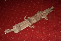 A WW1/2 ERA MILITARY EXTRICATION STRETCHER, wood/canvas construction, has many fastening securing