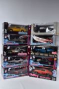 A COLLECTION OF ASSORTED BOXED 1:18 SCALE DIECAST AMERICAN CAR MODELS, to include Ertl