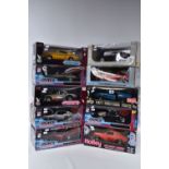 A COLLECTION OF ASSORTED BOXED 1:18 SCALE DIECAST AMERICAN CAR MODELS, to include Ertl