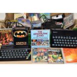 THREE ZX SPECTRUM COMPUTERS AND A QUANTITY OF AMIGA GAMES, games include Wizball, The New Zealand