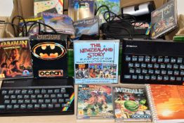 THREE ZX SPECTRUM COMPUTERS AND A QUANTITY OF AMIGA GAMES, games include Wizball, The New Zealand