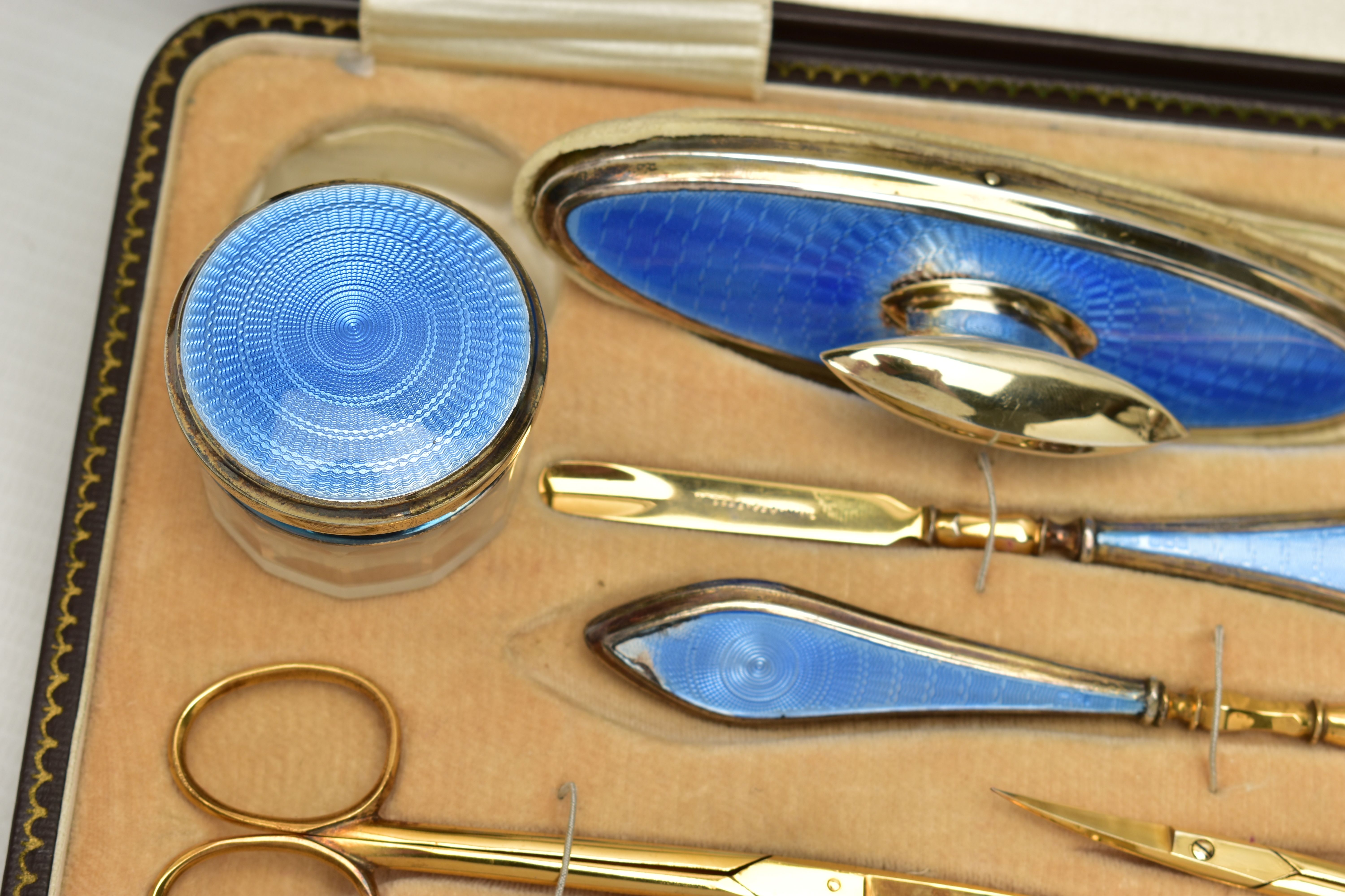 AN EARLY 20TH CENTURY CASED SILVER GUILLOCHE ENAMEL MANICURE SET, eight piece set comprising of - Image 3 of 5