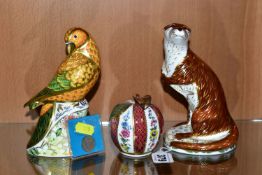 TWO ROYAL CROWN DERBY PAPERWEIGHTS AND A ROYAL WORCESTER CANDLE SNUFFER, comprising 'Playful