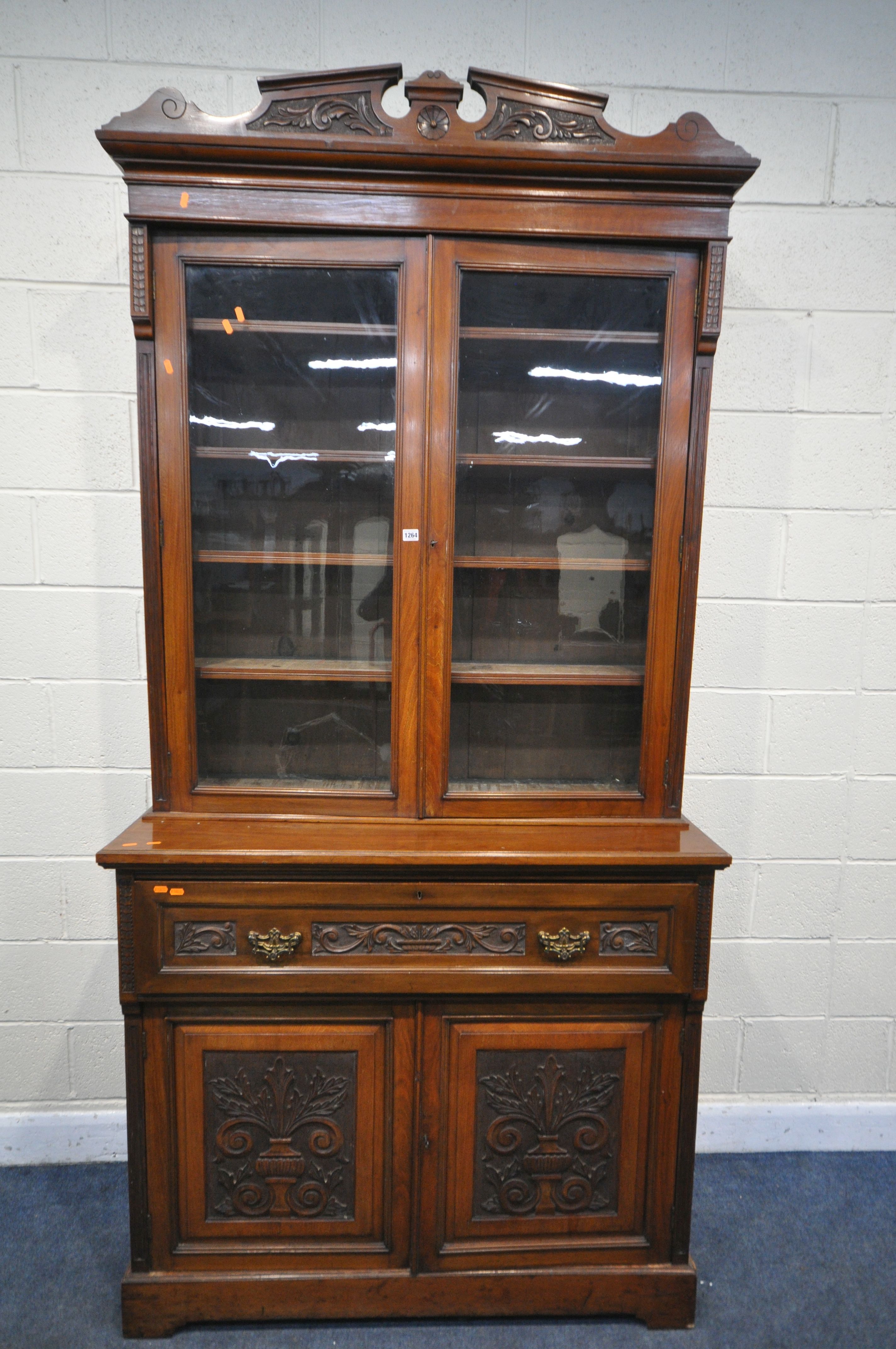 A LATE 19TH/EARLY 20TH CENTURY WALNUT SECRETAIRE BOOKCASE, the top with two glazed doors, over a