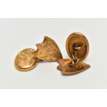 A PAIR OF EARLY 20TH CENTURY 9CT GOLD CUFFLINKS, each cufflink designed with an oval and a shield