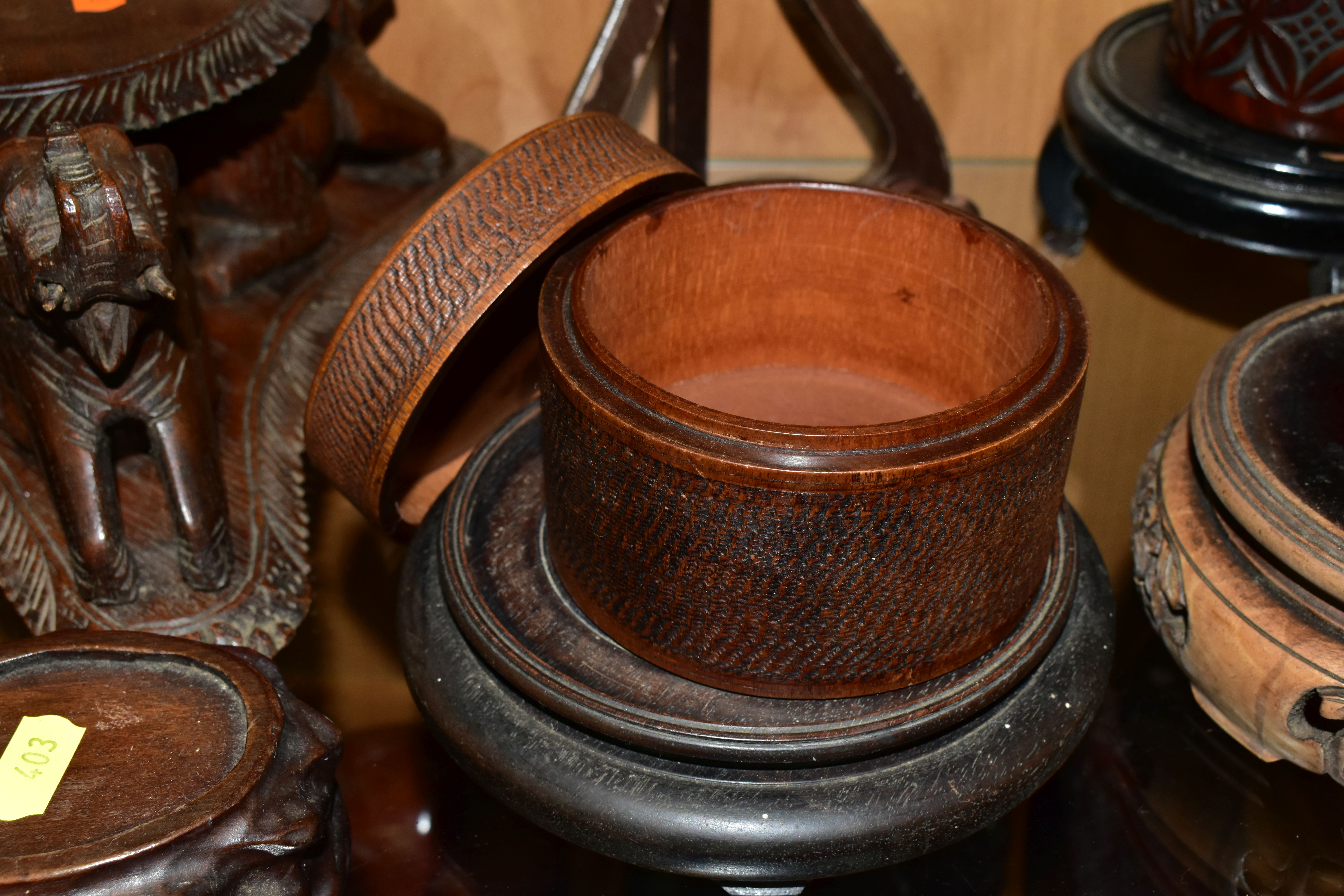 A QUANTITY OF WOODEN VASE STANDS, comprising an Arts & Crafts style tobacco jar with carved - Image 8 of 13