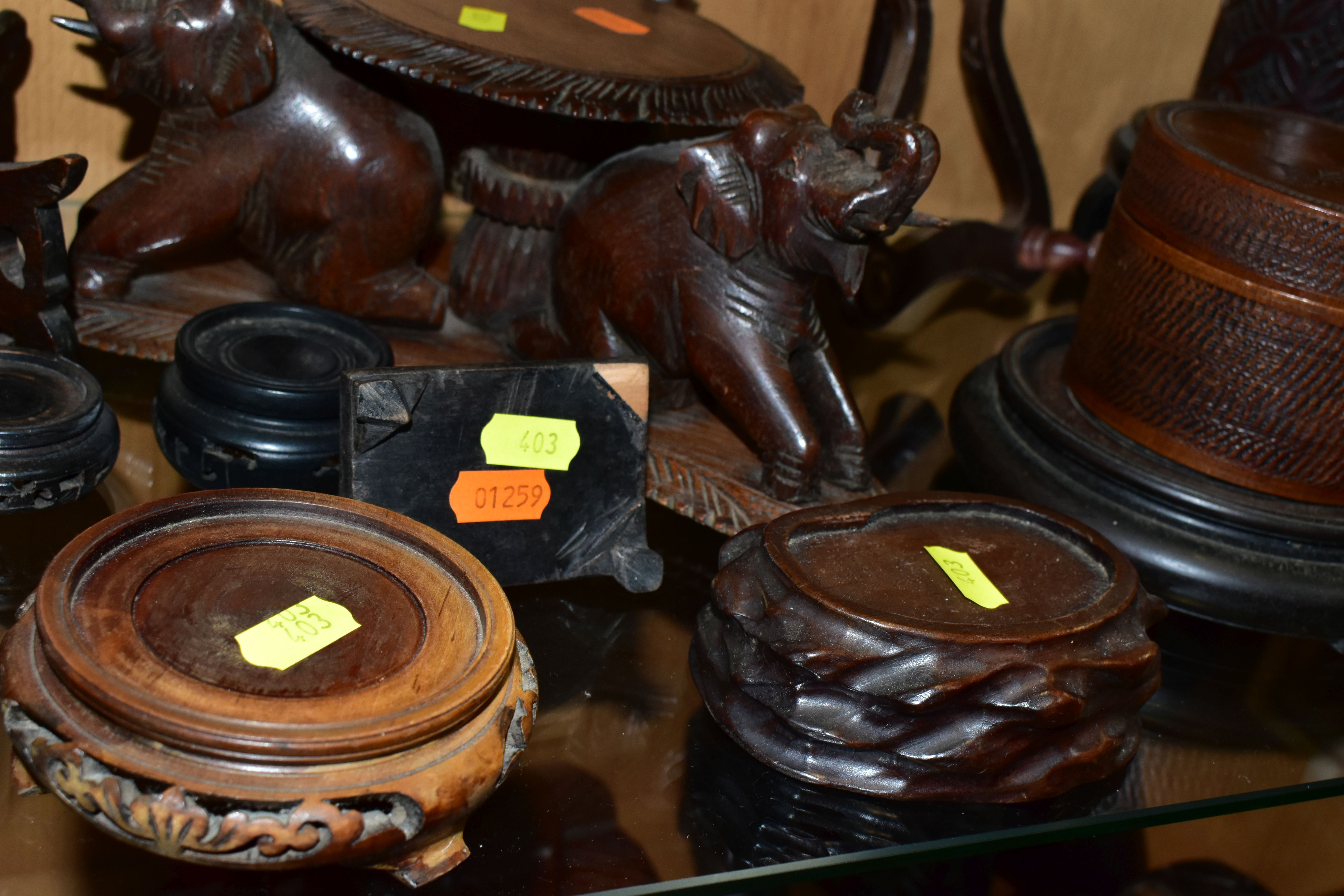 A QUANTITY OF WOODEN VASE STANDS, comprising an Arts & Crafts style tobacco jar with carved - Image 7 of 13