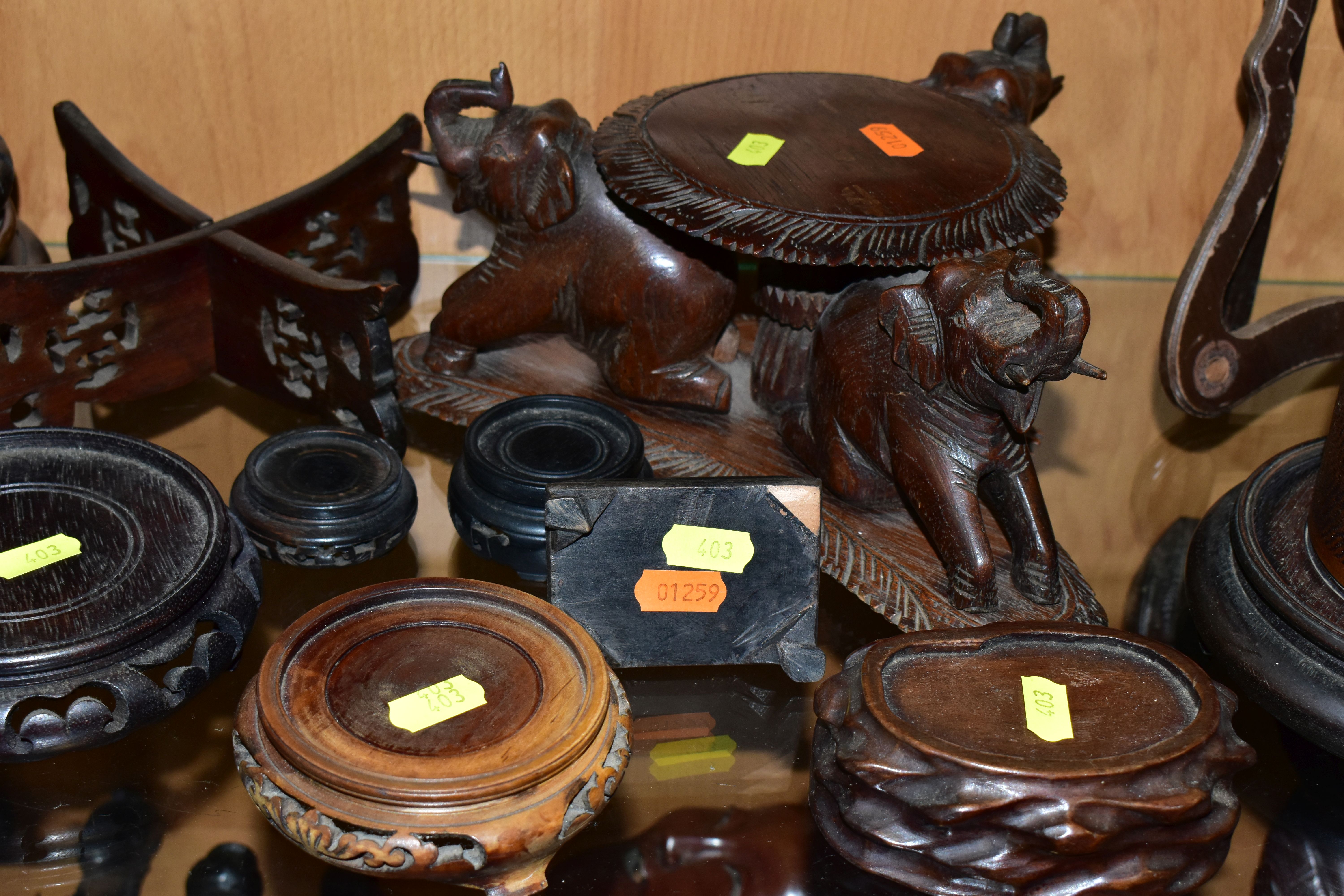 A QUANTITY OF WOODEN VASE STANDS, comprising an Arts & Crafts style tobacco jar with carved - Image 2 of 13