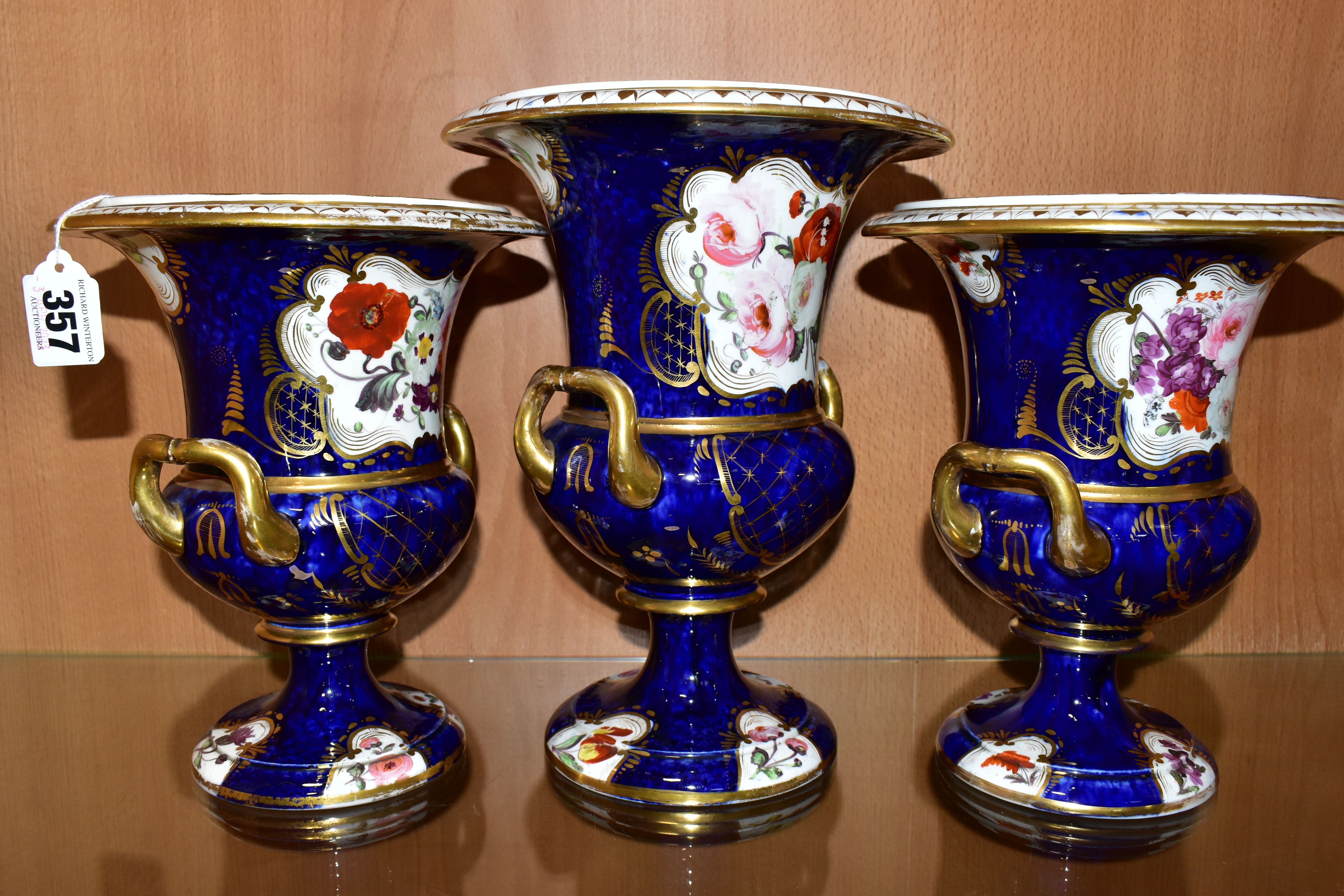 THREE VICTORIAN PORCELAIN TWIN HANDLED URNS, hand painted with panels of flowers on a fish scale - Image 2 of 8