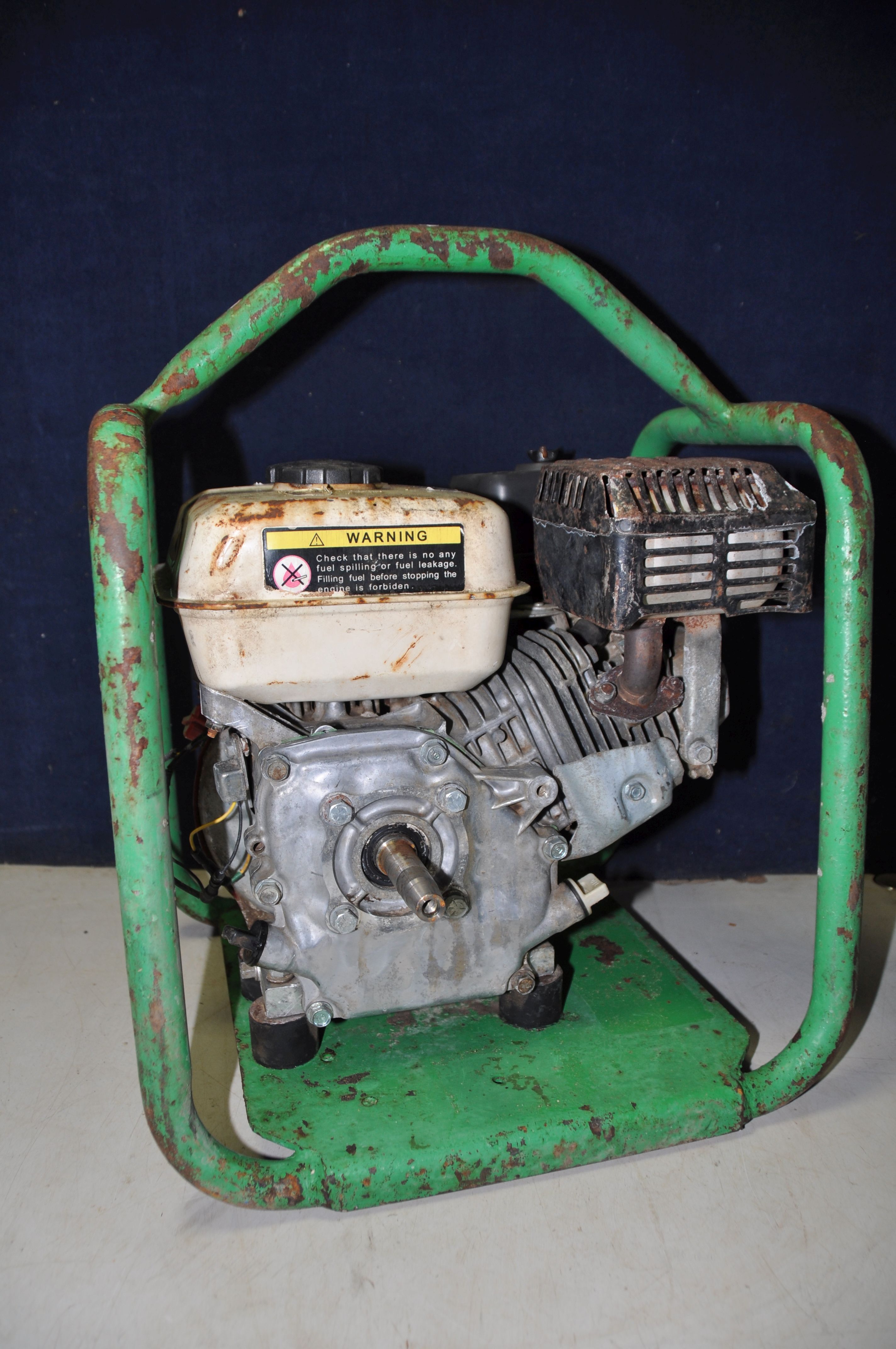 A PETROL GENERATOR engine and model Unkown, enclosed in a tubular frame (UNTESTED but engine pulling - Image 2 of 2