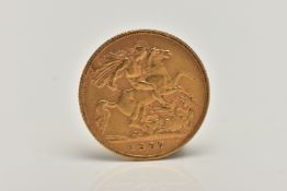 AN EARLY 20TH CENTURY HALF GOLD SOVEREIGN COIN, obverse depicting Edward VII, reverse George and the