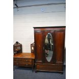 A 20TH CENTURY MAHOGANY WARDROBE, with a single mirrored door, above a single drawer, width 126cm