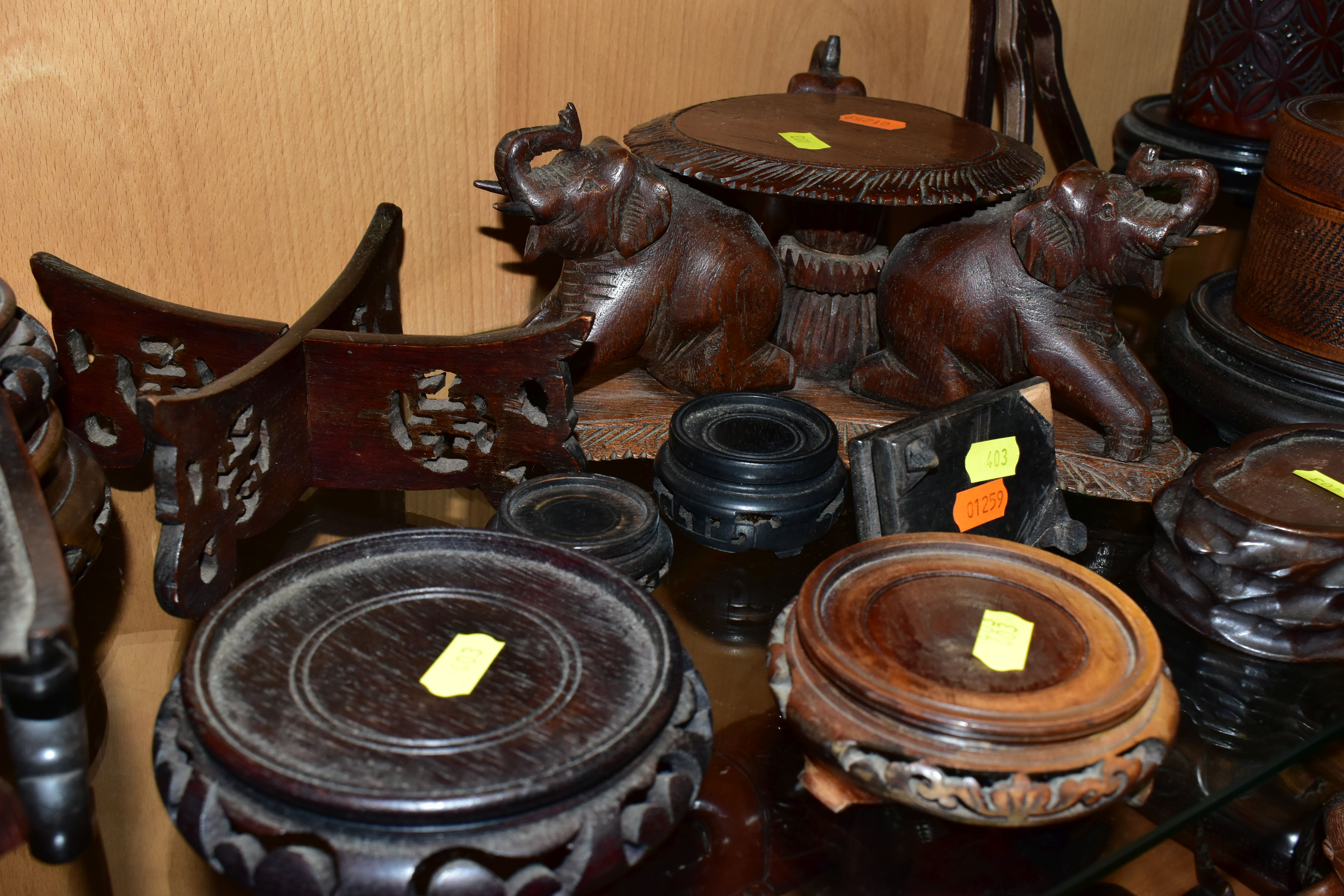 A QUANTITY OF WOODEN VASE STANDS, comprising an Arts & Crafts style tobacco jar with carved - Image 6 of 13