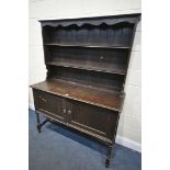 A EARLY 20TH CENTURY STAINED OAK DRESSER, 137cm x depth 52cm x height 187cm (condition:-worn