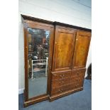 AN EARLY 20TH CENTURY MAHOGANY AND CROSSBANDED COMPACTUM WARDROBE, the double panel doors