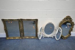 A PAIR OF GILT FRAMED WALL MIRRORS, a foliate framed wall mirror, and a French cream triple dressing