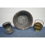 A LARGE COPPER DISH, labelled Outback to rim, diameter 74cm, and two coal scuttles (3)