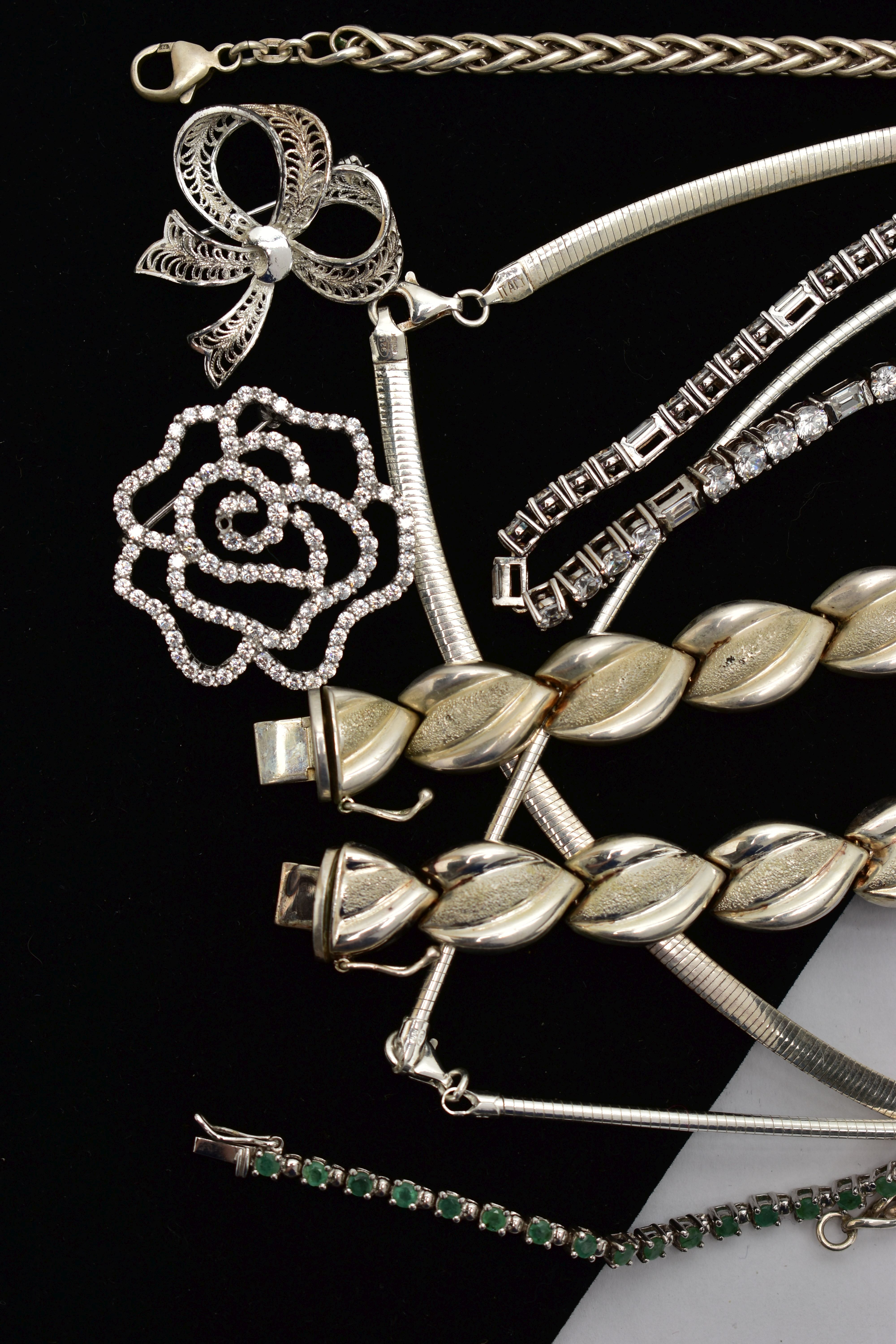 A BAG OF ASSORTED SILVER JEWELLERY, to include two articulated bracelets, each hallmarked - Image 2 of 4