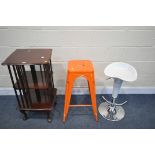 A MODERN MAHOGANY REVOLVING BOOKCASE, on cabriole legs, 46cm squared x 88cm, along with a modern