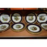 A VICTORIAN ENGLISH PORCELAIN DESSERT SERVICE, the raised gilt borders surrounding a blue band,