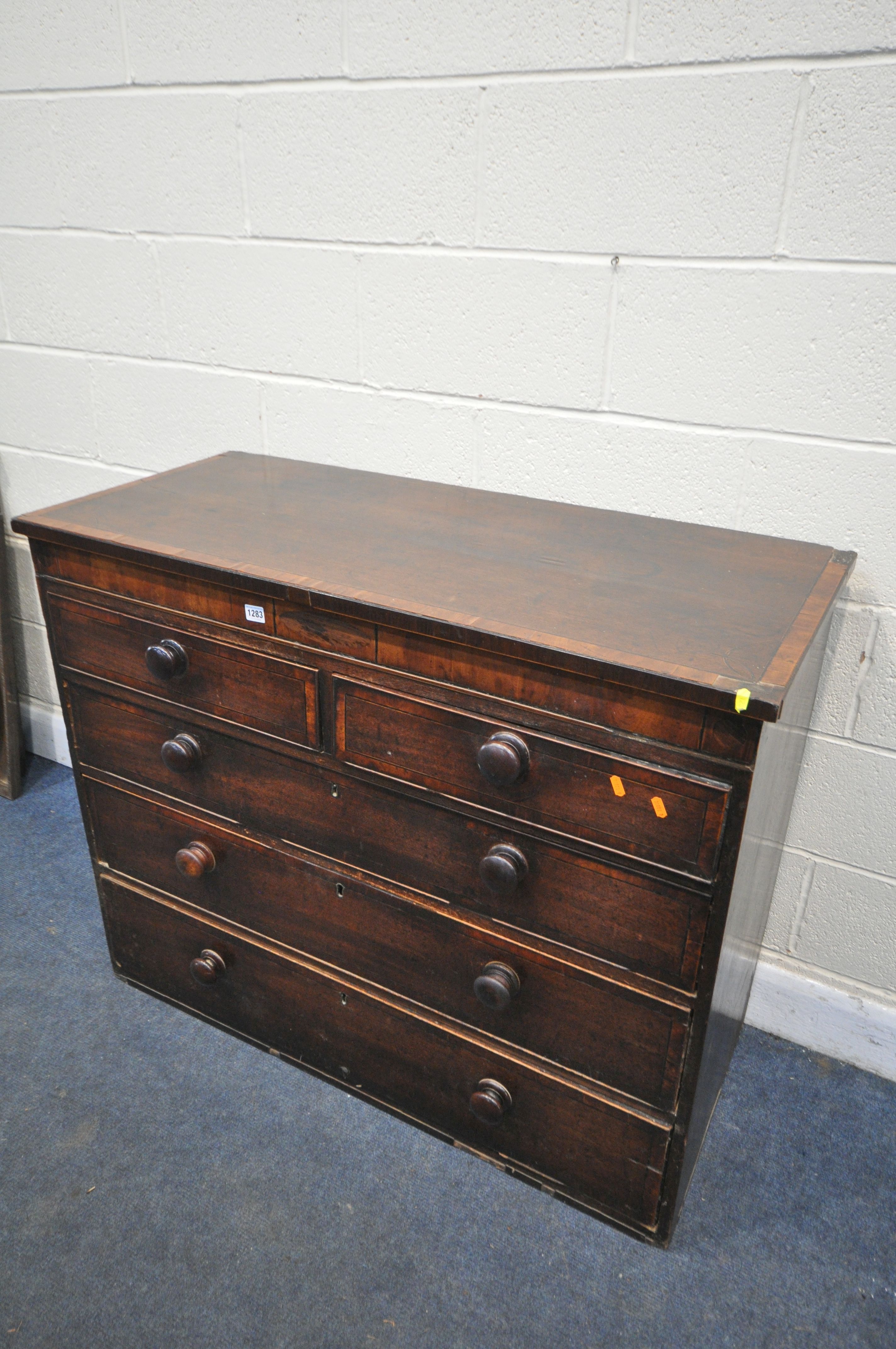 A GEORGIAN MAHOGANY AND CROSSBANDED CHEST OF TWO SHORT OVER THREE LONG DRAWERS, with turned handles,