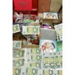 A LARGE AND HEAVY BOX OF COINS BANKNOTES AND COMMEMORATIVES, to include Crown coins worn 1819, 1935,