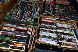 FOUR BOXES OF DVDS AND COMPACT DISCS containing approximately 300-350 compact discs and