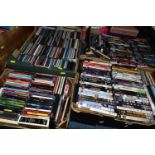 FOUR BOXES OF DVDS AND COMPACT DISCS containing approximately 300-350 compact discs and