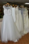 A GROUP OF EIGHT WEDDING DRESSES AND FOUR GREY BRIDESMAID DRESSES, retail stock clearance with