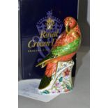 A BOXED LIMITED EDITION ROYAL CROWN DERBY LORIKEET PAPERWEIGHT with certificate numbered 777/2500,